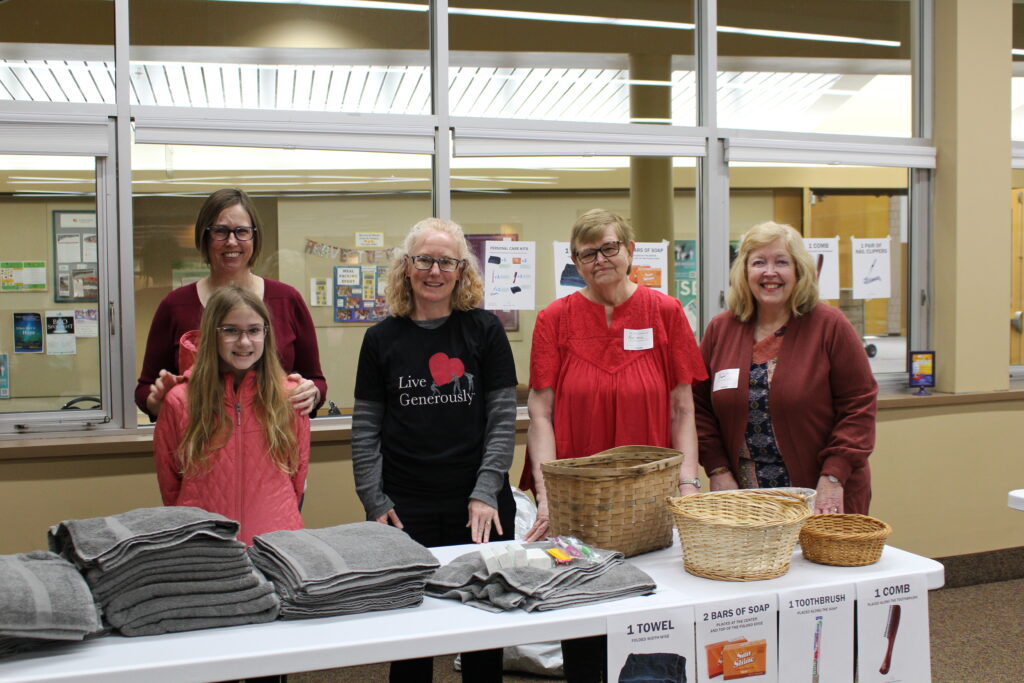 Volunteers assembling care kits